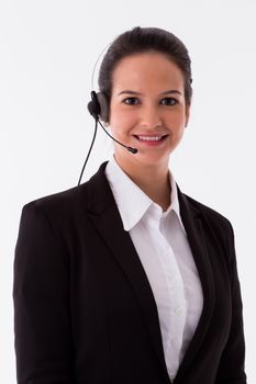 Training & Courses Elegant businesswoman wearing a headset in a professional studio portrait on a white background.